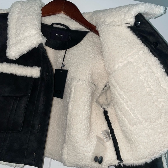 Revolve NBD Dolly Faux Shearling Jacket in Black & Ivory - Picture 8 of 16